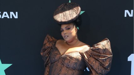 Lizzo Wrapped Her Locs Into Space Buns