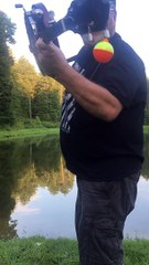 Man Catches Fish with A Banjo