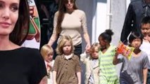 Angelina Jolie looks as though she’s started Christmas shopping with youngest daughter Vivienne