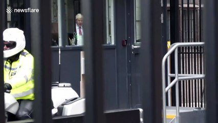 UK PM Boris Johnson avoids Extinction Rebellion protest by using side entrance