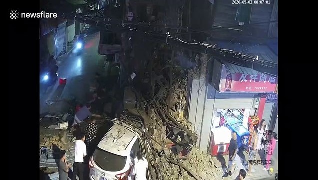 Shop collapses after being crashed into by car, injuring two in China