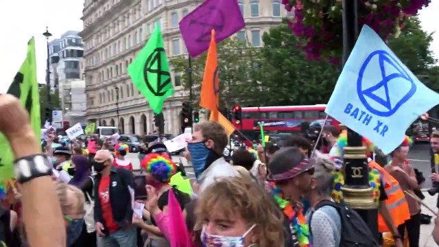 Extinction Rebellion paints Trafalgar Square pink at the Carnival of Corruption