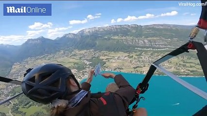 Woman drops her iPhone from more than 5,000ft while paragliding