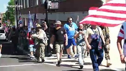 Heavily armed groups march through Louisville, Kentucky