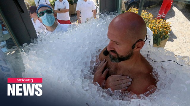 Austrian man breaks world record for longest time submerged in ice