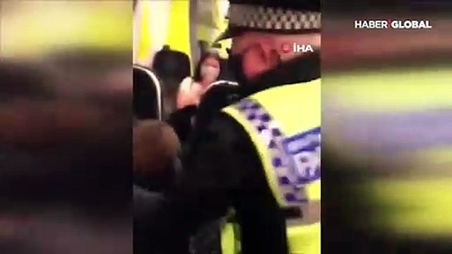 Trende maske takmayan yolcuya polis şiddeti