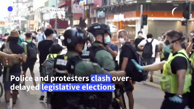Hong Kong police swoop on postponed poll protests