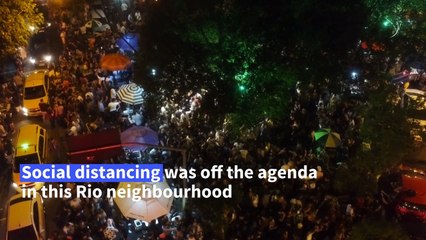 Hundreds shun social distancing at street party in virus-hit Rio