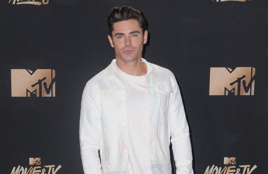 Zac Efron and Vanessa Valladares 'are having fun together'