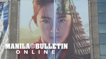 Posters of Mulan movie in Bangkok as boycott calls grow