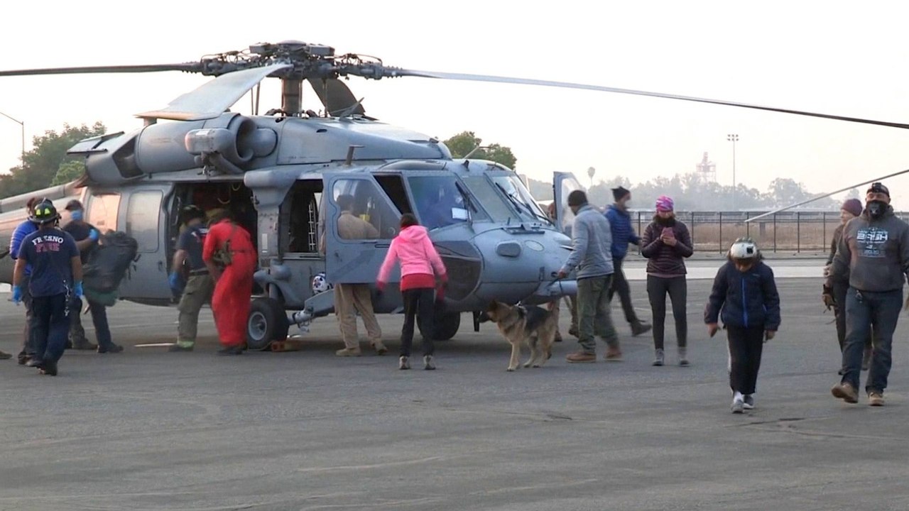 California wildfires: Helicopters rescue more people from blazes