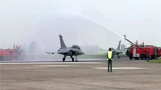 Rafale fighter jets receive water canon salute