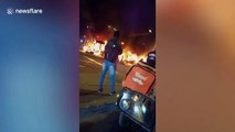 Bus engulfed in flames as violence erupts in Bogota over taxi driver's death