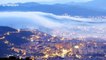 Mesmerising footage as clouds fall from the mountains covering Barcelona in fog before drifting out to the Mediterranean at sunrise