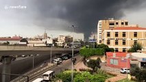 Cloud of smoke engulfs sky after warehouse fire at Beirut port