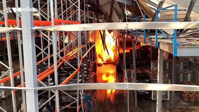 'No one knows how it began': Watch fire crews in Beirut tackle blaze that erupted at the city's port