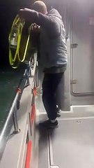 Capt Harry Grantham embarking on his cross-Channel swim