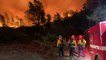 Californian firefighters battle wildfire under orange sky
