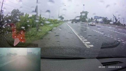 Truck Causes Close Call on Rainy Road