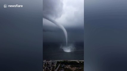 Huge waterspout swirls over sea in eastern China