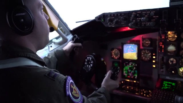 KC-135 Stratotanker • Refuels a U.S. Air Force B-52 Stratofortress • Over the Arctic Sea