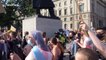 Police guard Winston Churchill statue as Trans Pride marchers arrive at Parliament Square