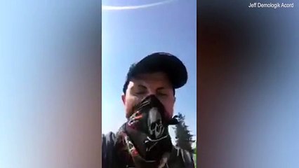 Man calls cops as wildfire blows onto highway
