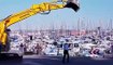 Port de Bouc: un acrobate apprivoise un engin de travaux publics