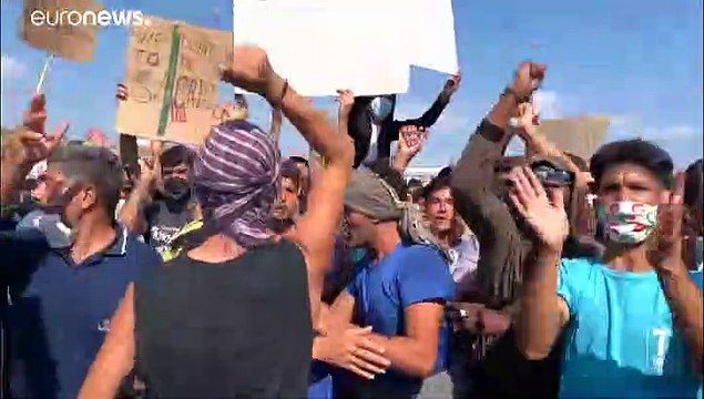 Displaced migrants on Lesbos island protest in wake of fire at Moira camp