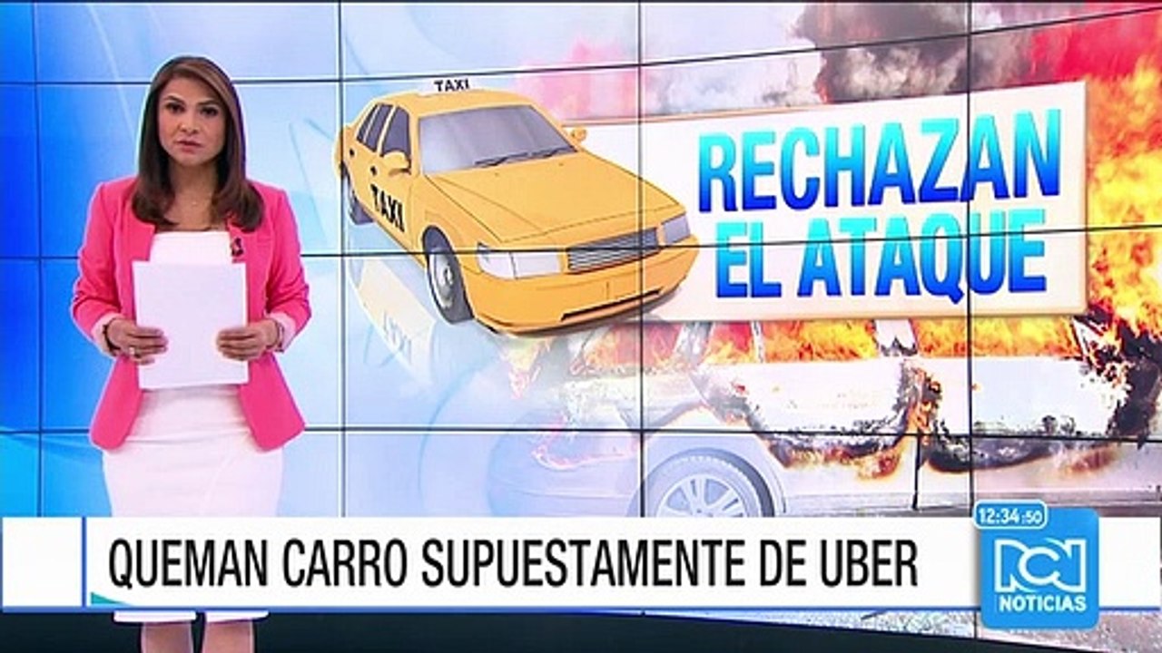 Policía busca a "taxis comprometidos" en quema de vehículo que sería de Uber en Bogotá