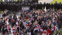 Belarus police detain hundreds of protesters in Minsk as crowds swell
