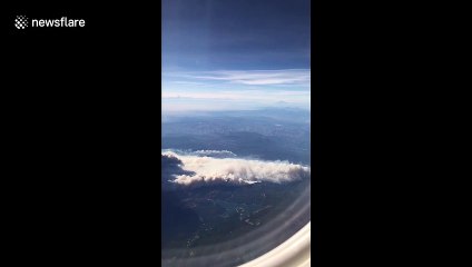 California plane passenger captures blanket of wildfire smoke from '30,000 feet'