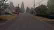 Drone footage shows wildfire smoke over suburban Oregon