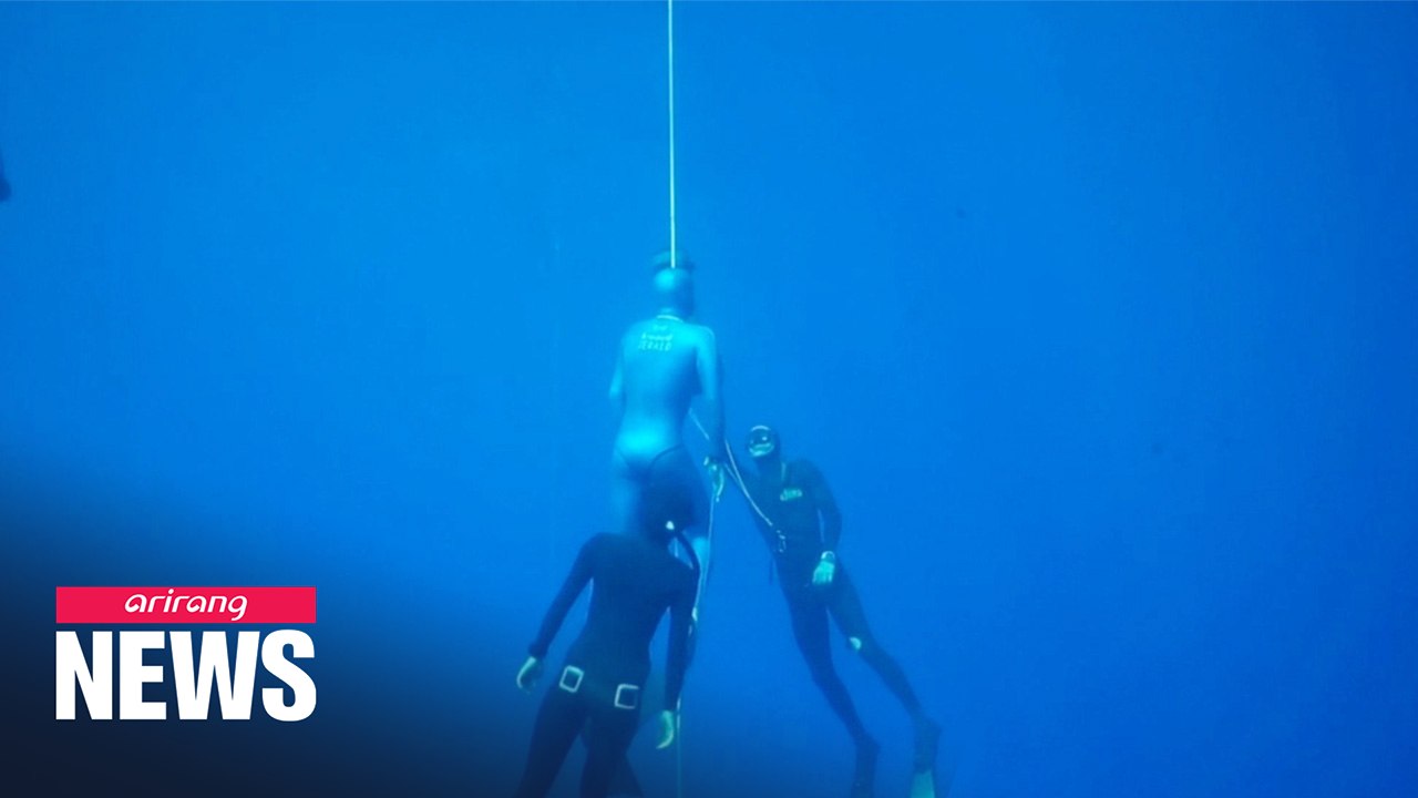 French free diver breaks world record in bi-fins deep diving