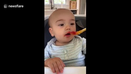 Baby gives disgusted reaction to sour plums but still wants more