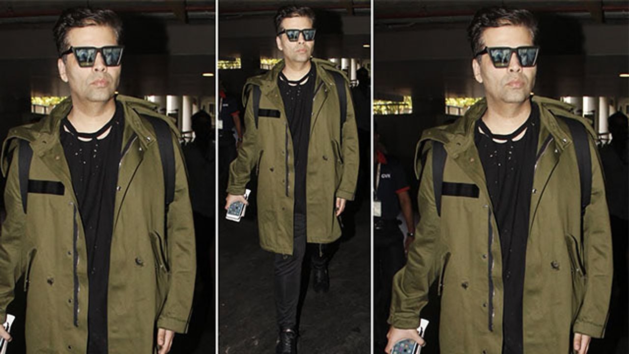 Sushant की मौत को लेकर ट्रोल होने के बाद Airport पर परिवार के साथ दिखे Karan Johar | FilmiBeat