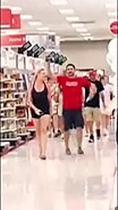 This video shows a crowd of anti-maskers 'invading' a Target in Fort Lauderdale, yelling 'take your masks off' and 'we're not going to take it anymore'