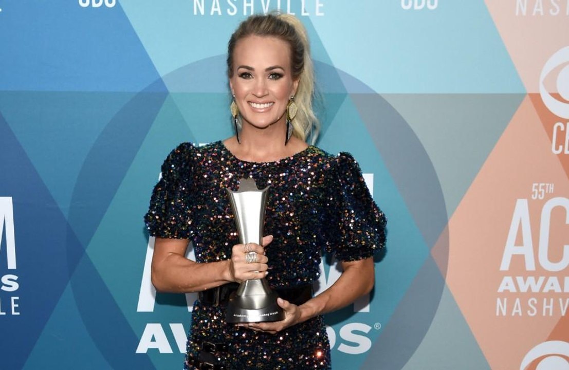 Carrie Underwood and Thomas Rhett make ACMs history as joint winners for Entertainer of the Year