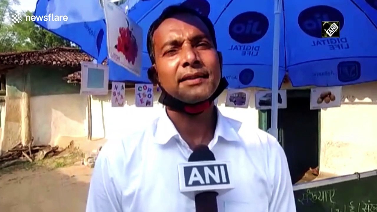 'Doorstop education' as Indian teacher conducts classes from back of his motorcycle