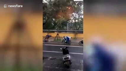 Typhoon Noul blows motorcyclists off bikes in Vietnam