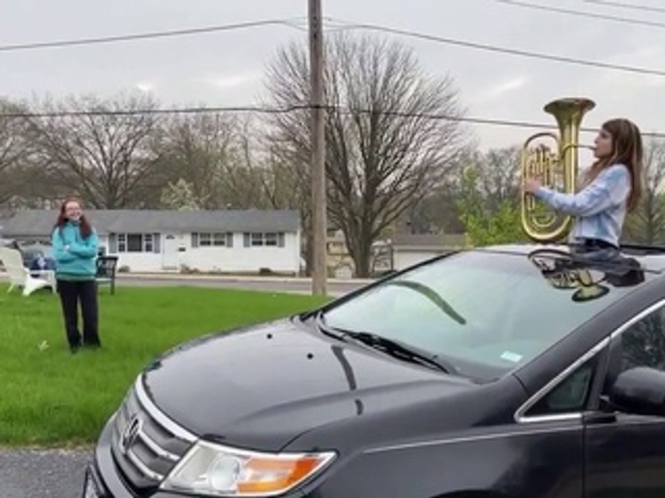 Girl Plays Trumpet From Car Wishing Happy Birthday to Quarantined Friend