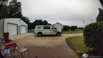 Thoughtful FedEx Driver Wraps Package on Rainy Day