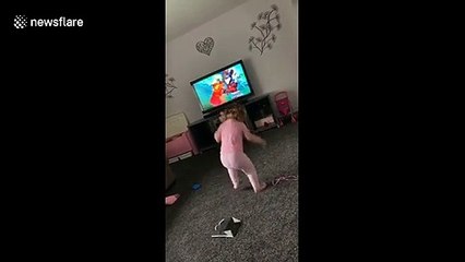 Turn down for what! Little girl gets her groove on to pop anthem