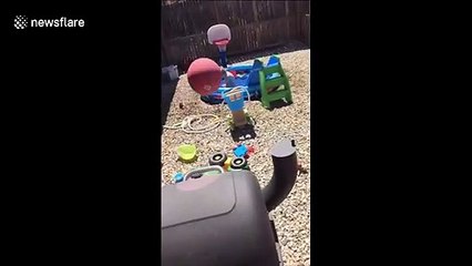 Little boy feels force of ball to the head during trick shots