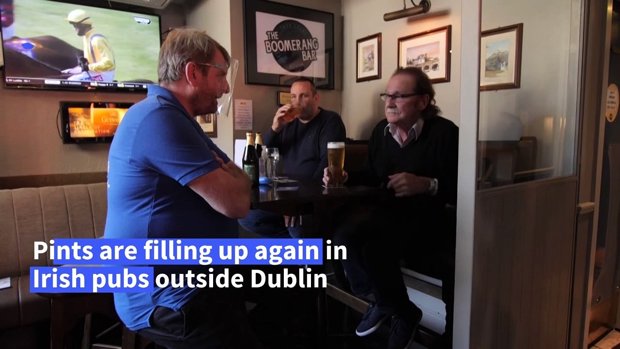Irish pubs outside Dublin reopen after virus hiatus, but capital stays dry