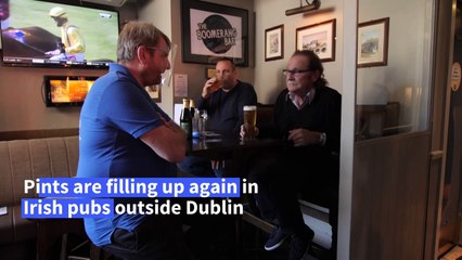 Irish pubs outside Dublin reopen after virus hiatus, but capital stays dry