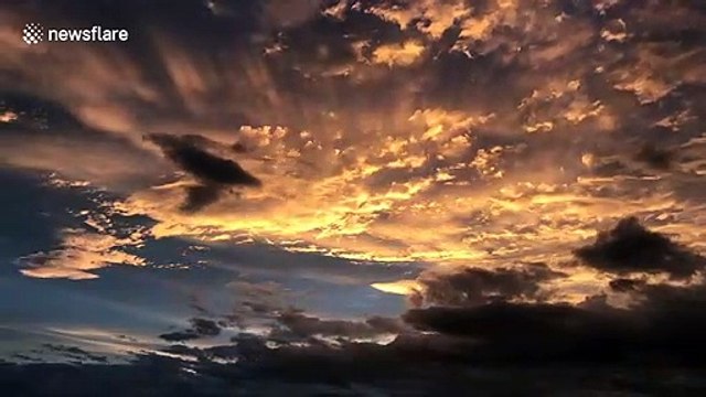 Watch as sun turns mammatus clouds orange at sunset as storm passes over Northumberland post Storm Ellen