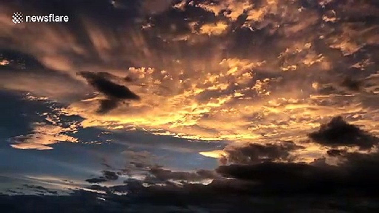 Watch as sun turns mammatus clouds orange at sunset as storm passes over Northumberland post Storm Ellen