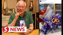 Najib reaches for his favourite snack as political drama heats up again