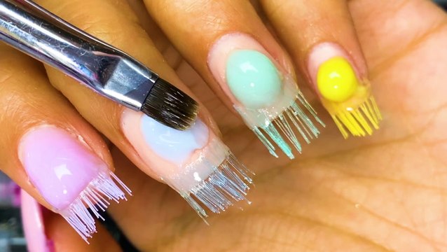 Use toothbrush bristles to create fake nails